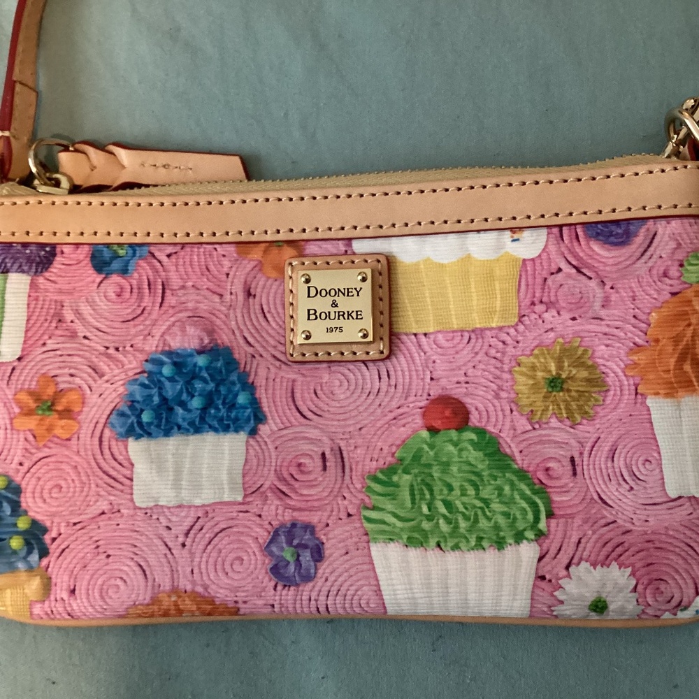 Rare Pink Dooney & Bourke wristlet with cupcake motif